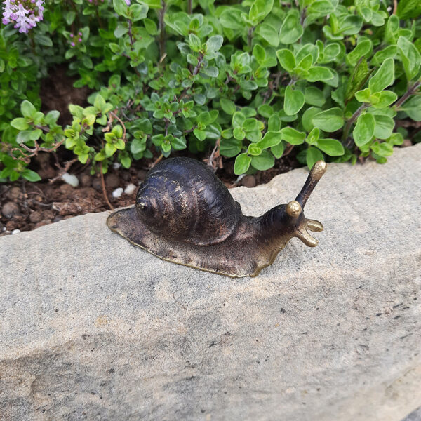 Schnecke Bronzefiguren